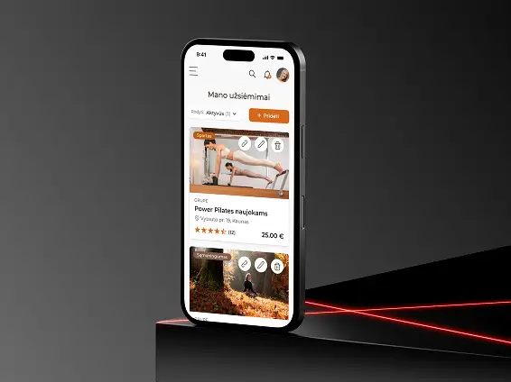 Mobile website design for a professional photography business displayed on a smartphone mockup.
